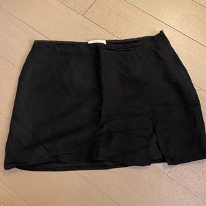 Black slit mini skirt